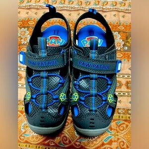 Brand new never been worn pair of Paw Patrol gym shoes for children… so cute!